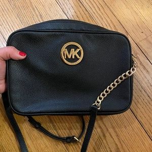 Black leather Michael Kors crossbody bag